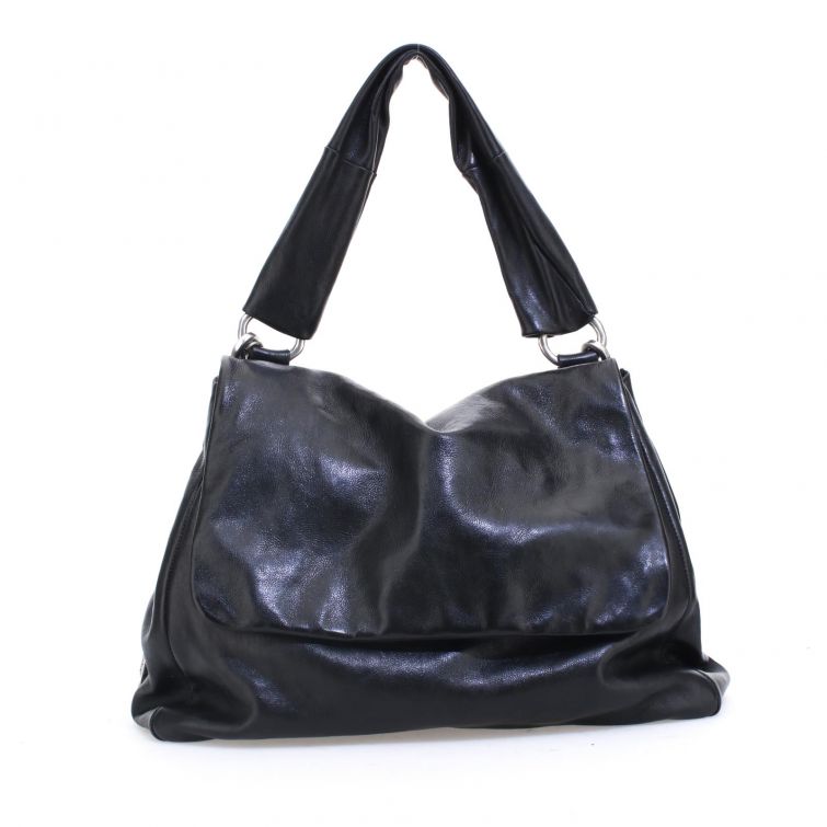 Borsa Jessye A.S.98 in pelle nera morbida con manico ampio, design artigianale italiano elegante e moderno.